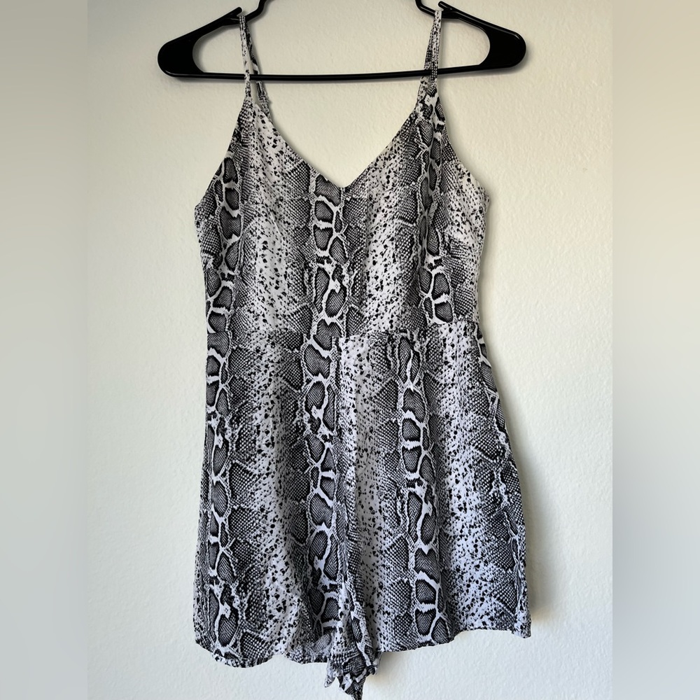 Millau romper in black and white snake print, size XS